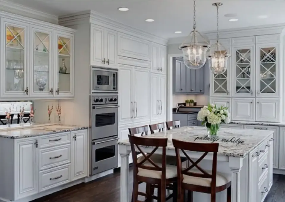 White Classic Kitchen – X-Mullion Glass Cabinets, Granite Island